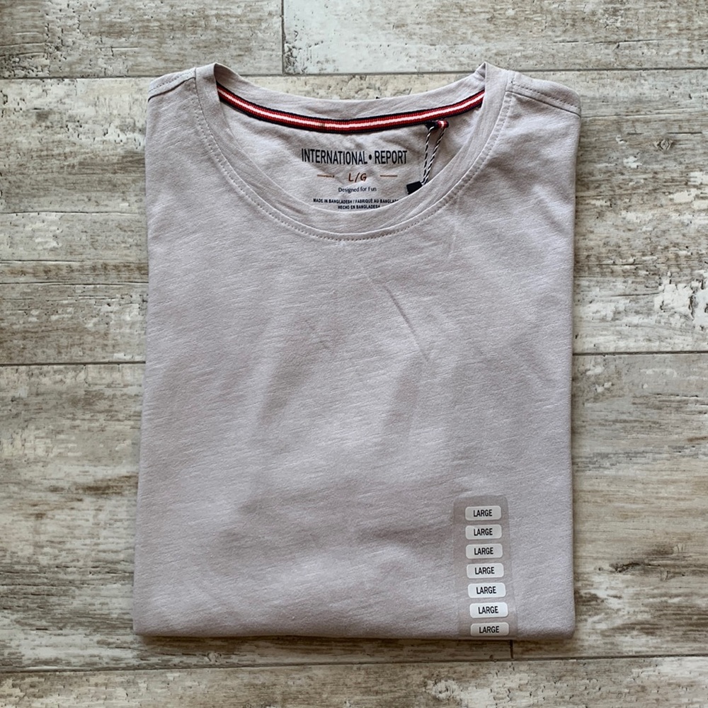 International Report crew tee